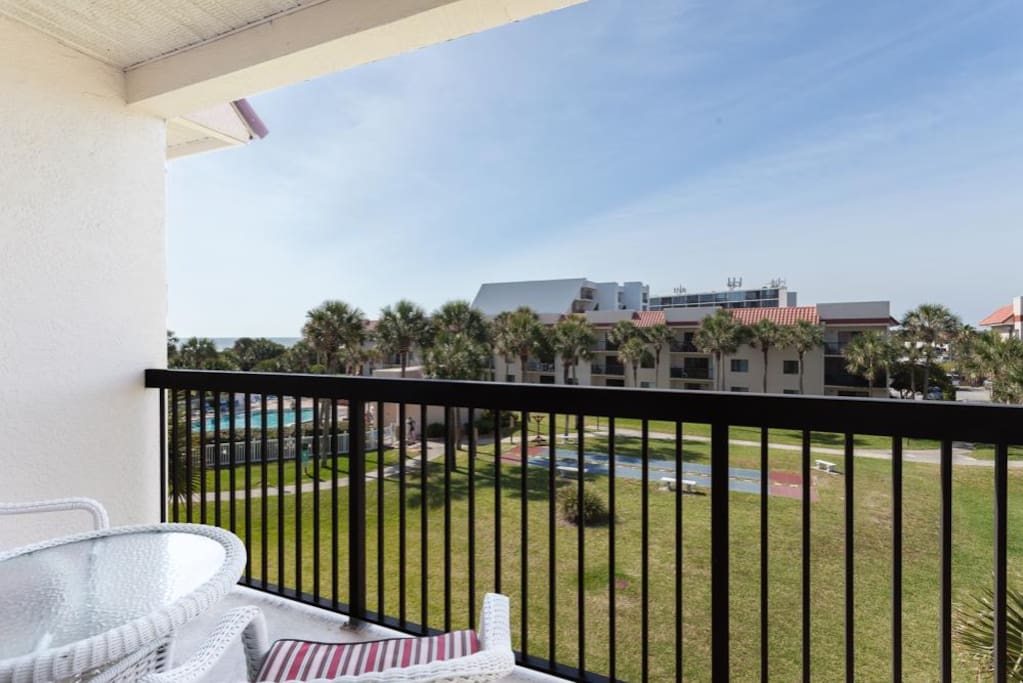 The view from the balcony - The covered balcony is the perfect place to sip your morning coffee or enjoy an after-dinner drink… o
