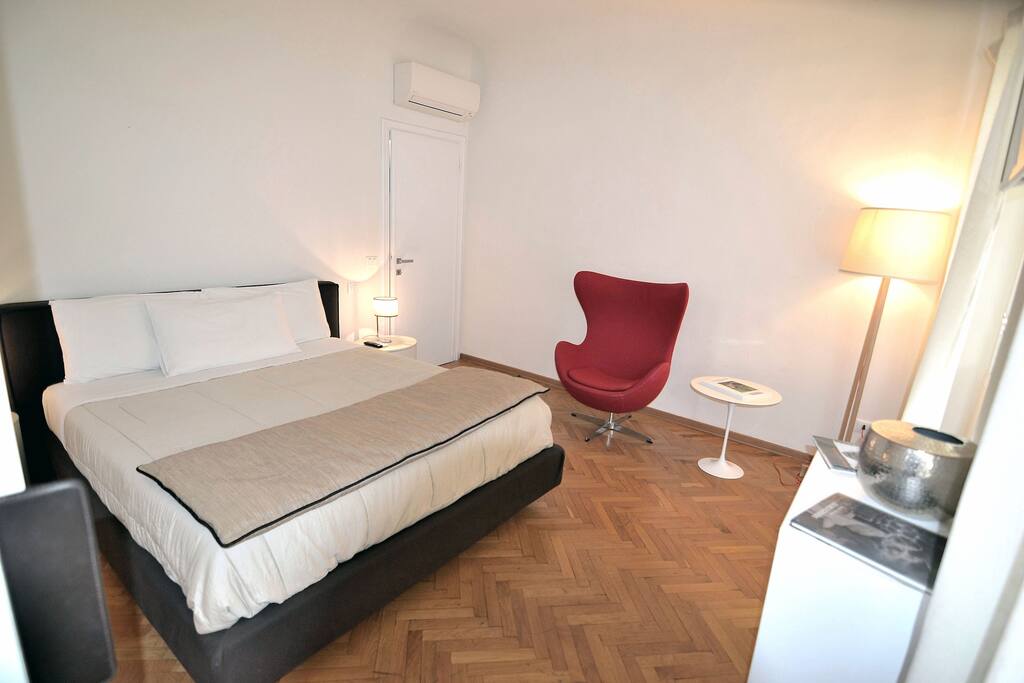 The master bedroom is very bright thanks to two big windows that face on a characteristic street of the historical center. No worry for the sun in the morning you can close the shutter and also the blackout blind ;)