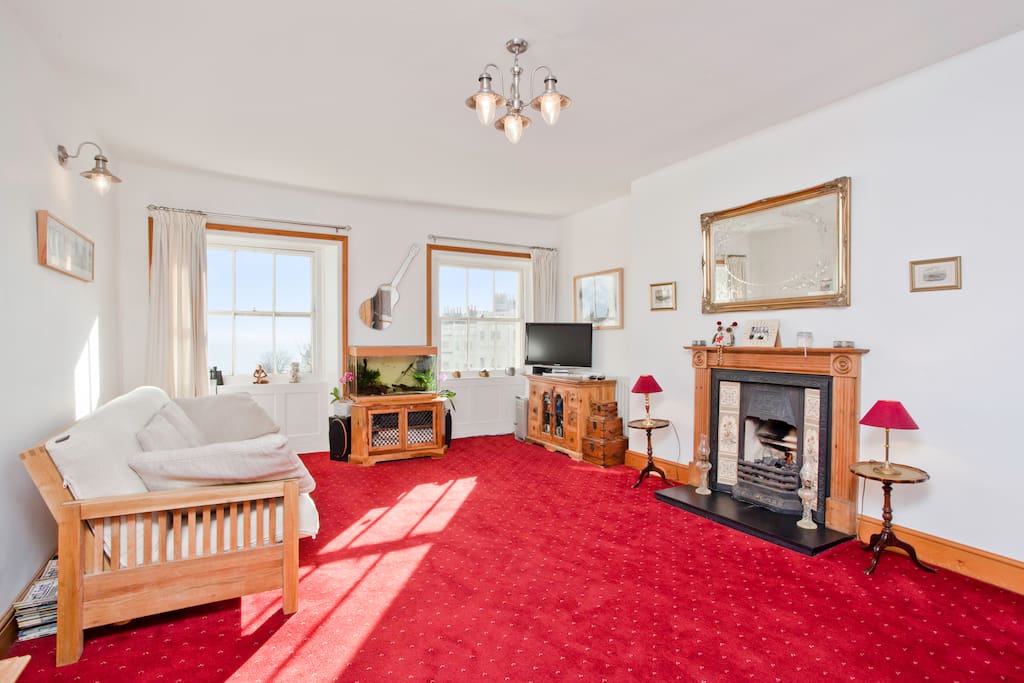 Large lounge with direct sea views over Brunswick Square