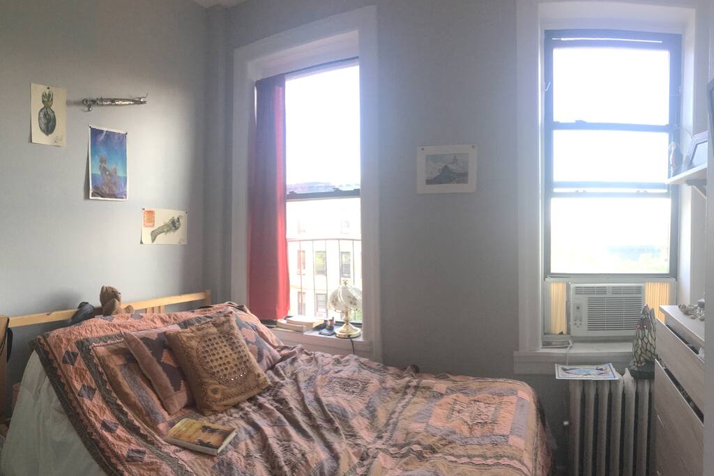 The cozy little bedroom! Plenty of extra pillows and blankets.