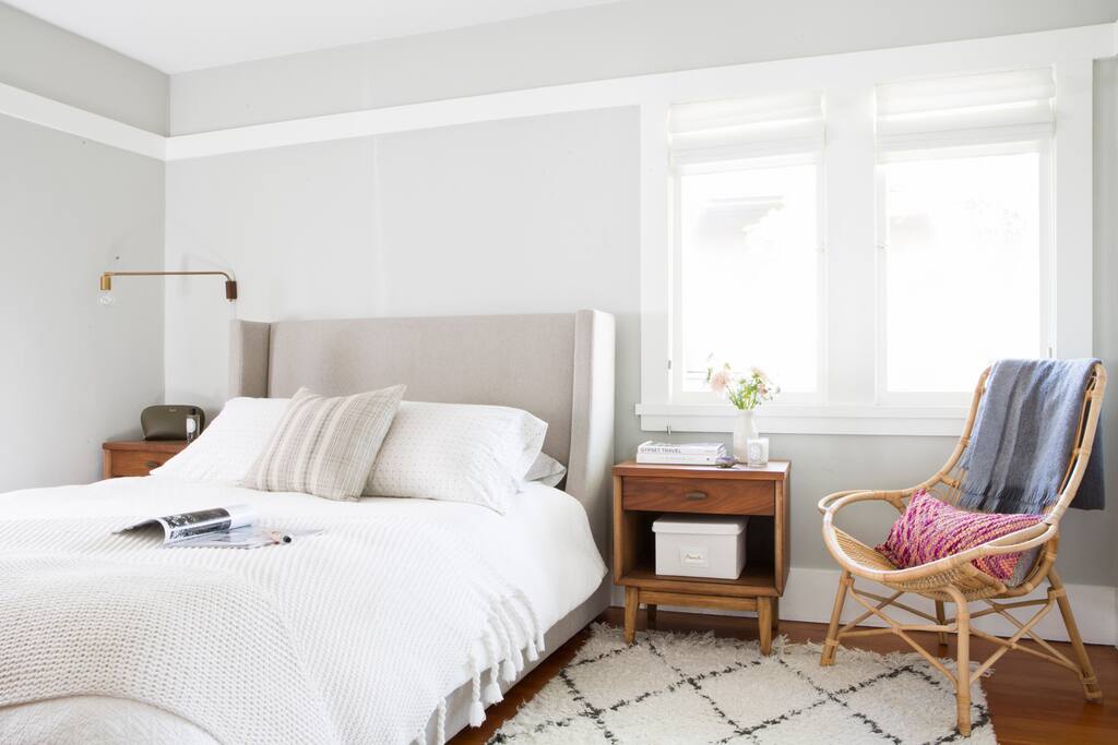 Master Bedroom with Room and Board Bed and Tuft and Needle mattress.