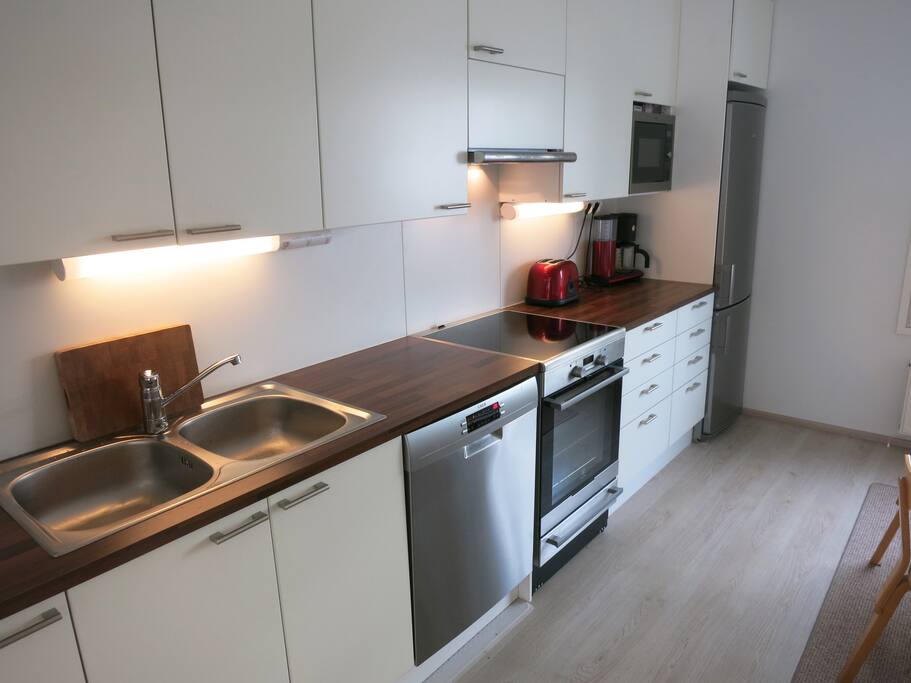 Kitchen has all the modern appliances available such as toaster, coffee machine, stove, oven, fridge, freezer and all the cutleries and other cooking equipment. There is a Artek-design table and chairs for 6 people to have a dinner in the kitchen.