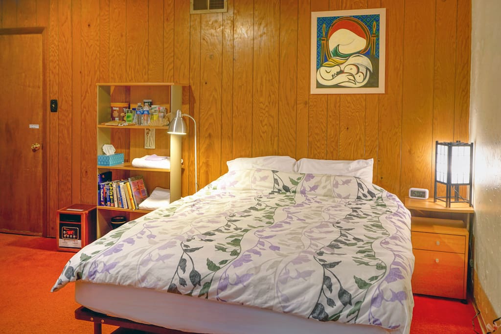 Queen size bed with comfortable mattress.