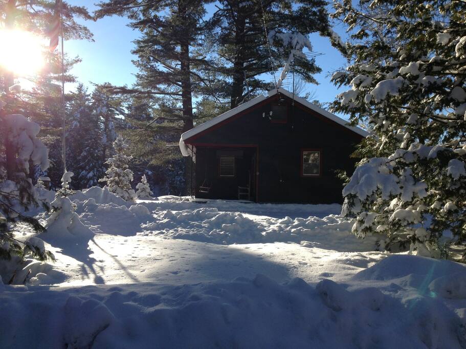 An image of Camp from the dirt road in winter