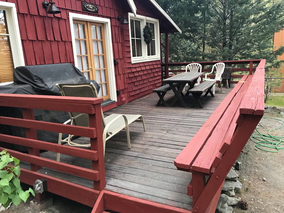 Patio deck with gas barbecue, dining table and plenty of seating