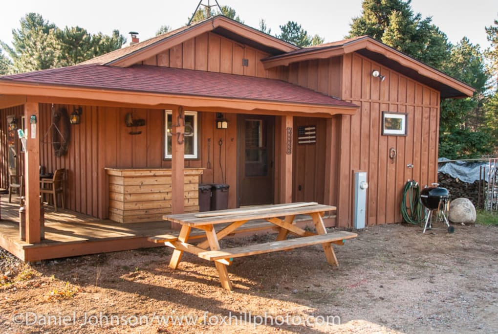 Side Entrance. Picnic tables, Weber grills and outdoor fire pit.