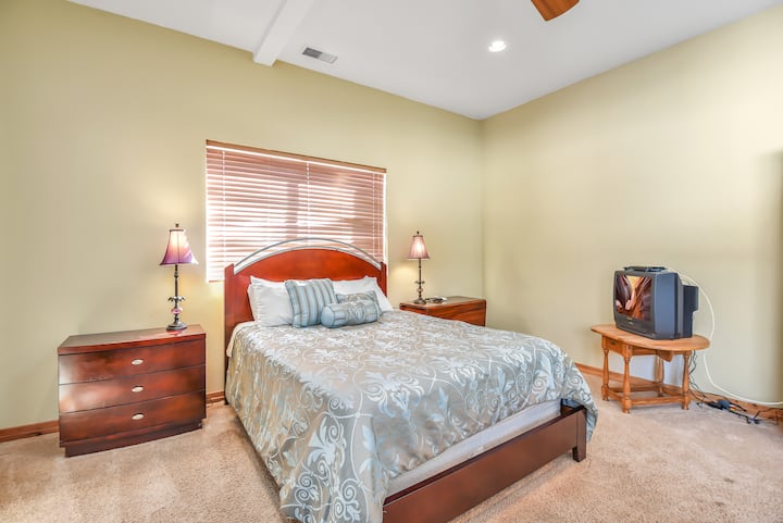This is the bedroom in the Carriage house. It is located on the ground floor. There is a king-size bed.