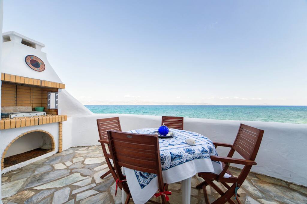Ground floor veranda with dining area and BBQ
