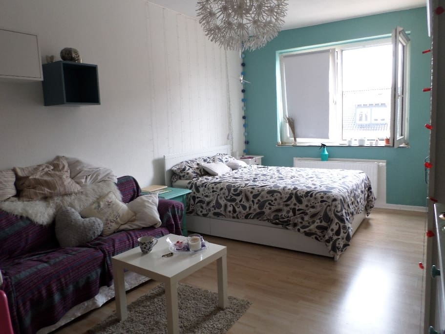 the room, double bad and sofa
