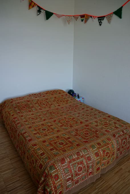 Bed in a 22 m² room