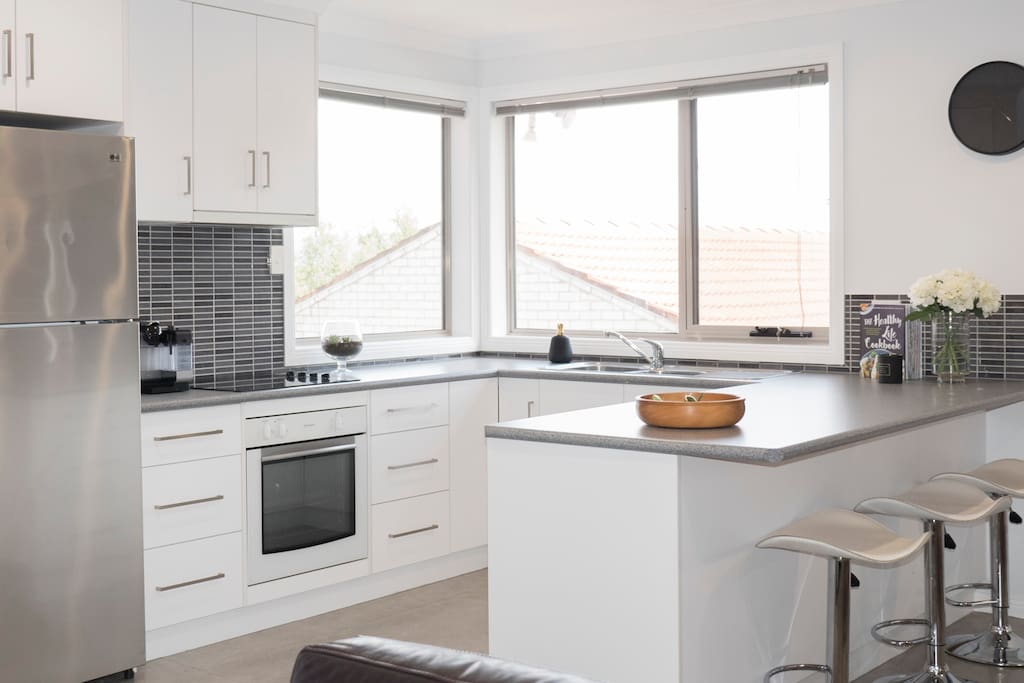 This spacious kitchen is perfect for family dining.