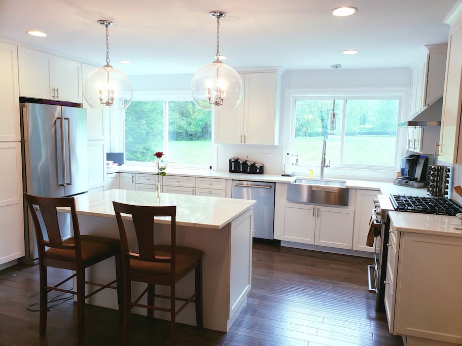 Kitchen with plenty of natural light opens to the large 2 acre yard