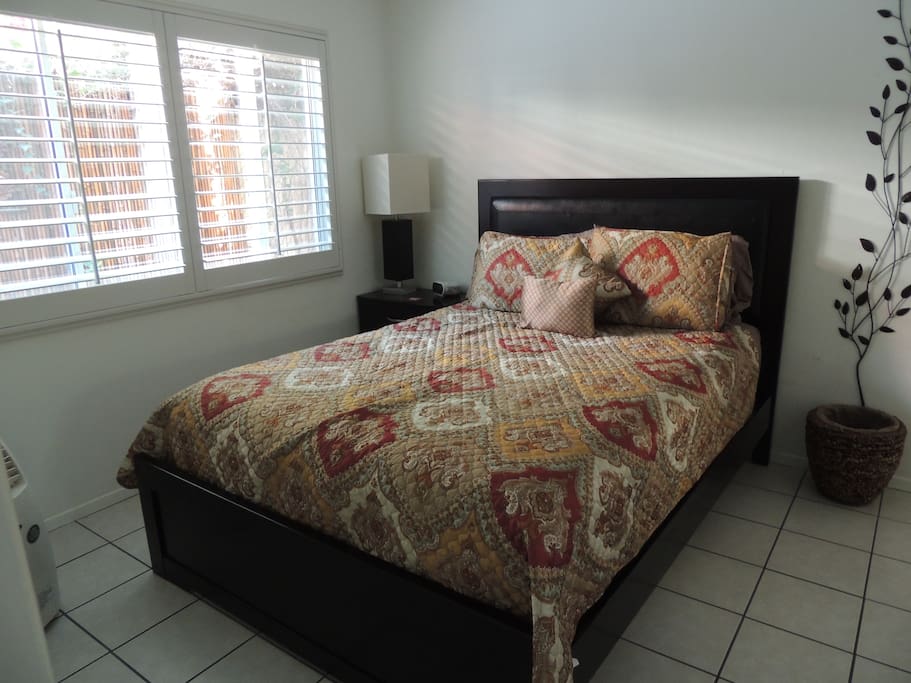 One of three Queen beds