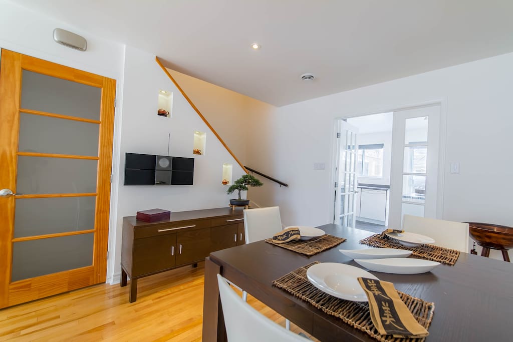 Dining area with seating up to 6 and surround sound.