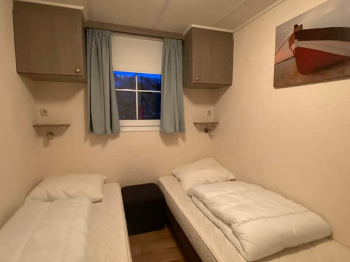 Bedroom with two single beds.