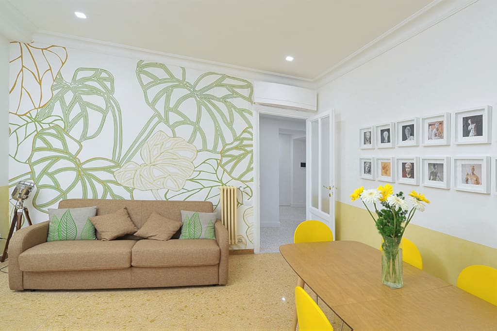 Exceptional natural light in our living room with a spacious table and an eco design wall paper