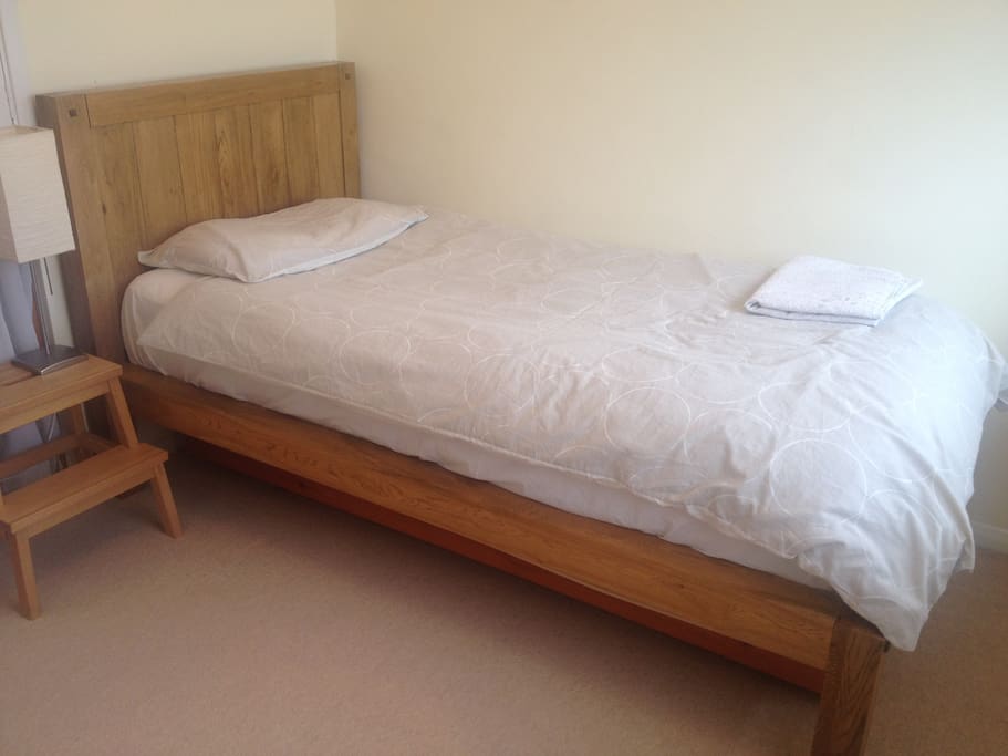 Super comfortable single bed (the second bed is folded underneath)