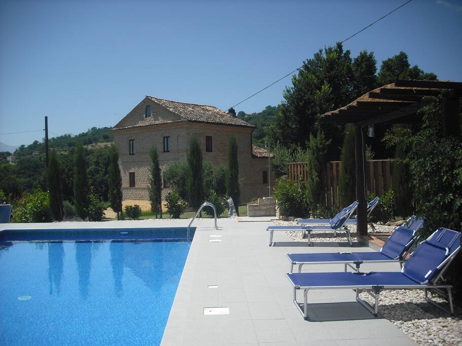 Elevated pool with stunning views across the Siblini mountains and Le Marche countryside.