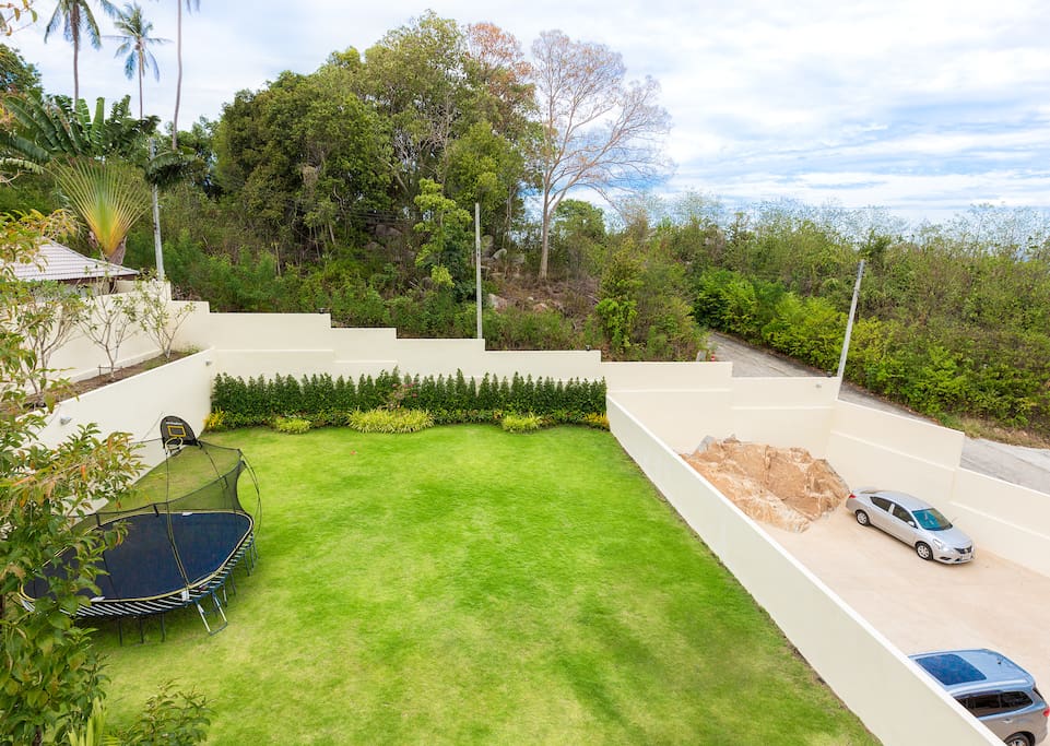 Huge garden with trampoline