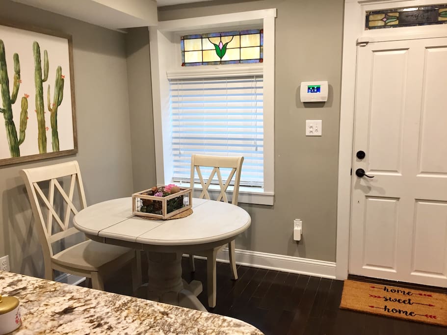 Front door, foyer and dining area.