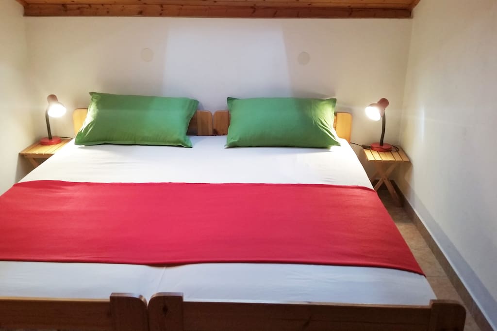 Bedroom with comfortable double bed.