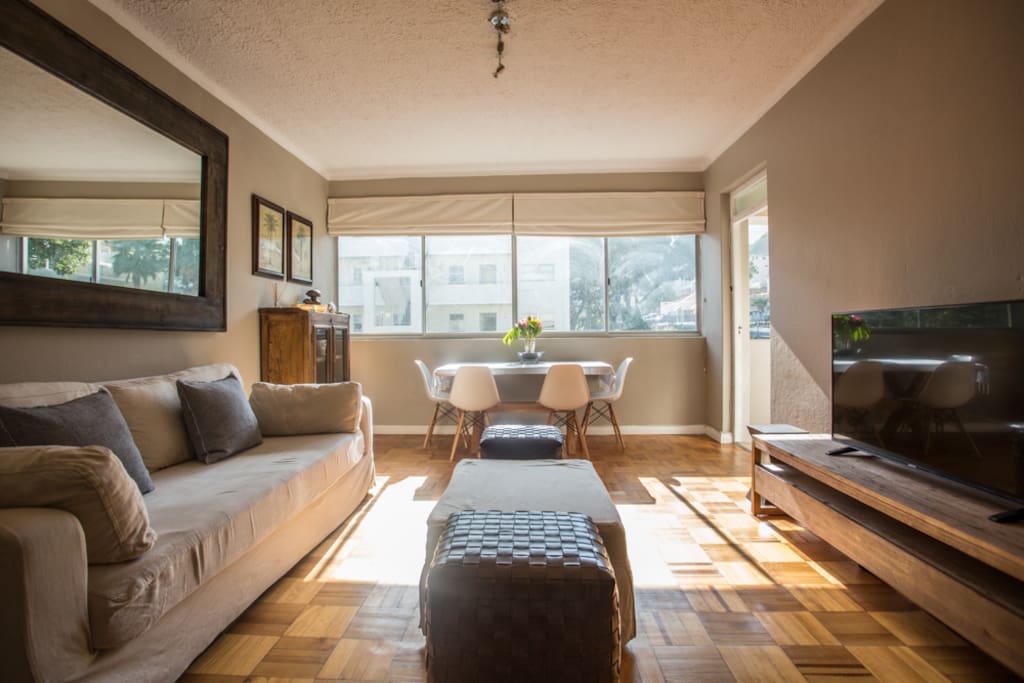 Nice light streaming into the living and dining room leading out to the open balcony.