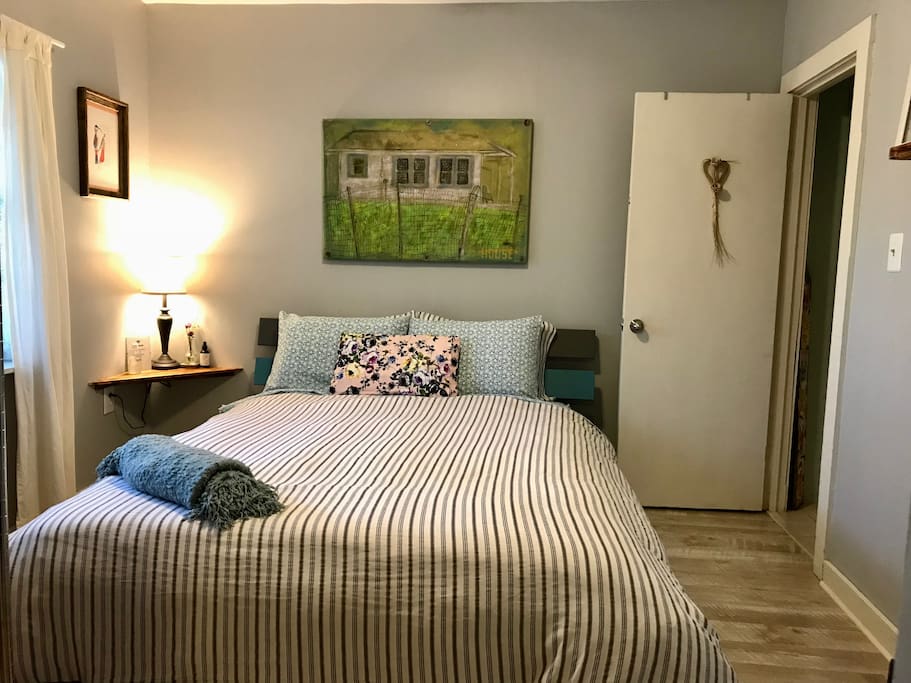 Your private bedroom with local art