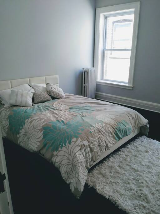 Large private bedroom with queen size platform bed