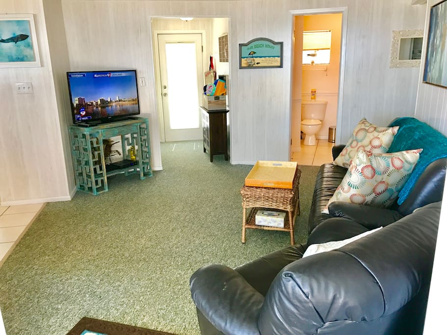 Widescreen & DVD with couch and recliner in Living area