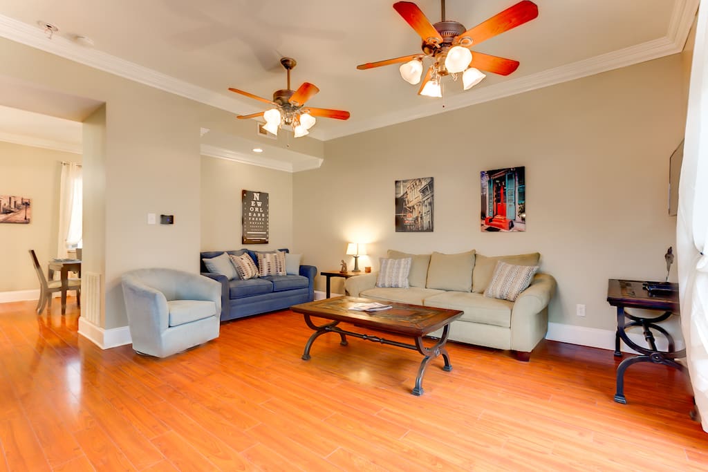 Spacious living room with ample comfortable seating.