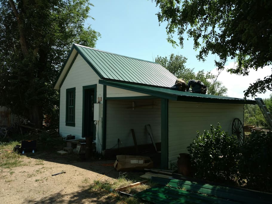 New roof was a surprise to us in 2016 as hail damage claim on the jeep rescue garage ended up including a new roof on the cottage. Wow! New trim boards had to be added many places as they had either never been there or had fallen off during the hundred years of the cottage existence. Looks like this roof could keep it for another hundred years. By staying with us Air bnb guest have helped to pay for the lumber needed to fix the trim under the roof so the roof could go on.