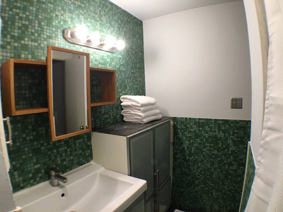 Mosaic green tile bathroom