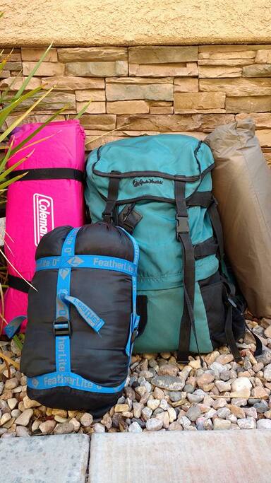 This is your camping kit. A backpack, tent, xown lightweight bag, and a pad.
