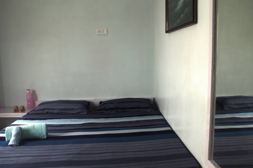 Our rooms are spacious, finely decorated, and come with closet, mirror, side table, and air conditioner or fans.