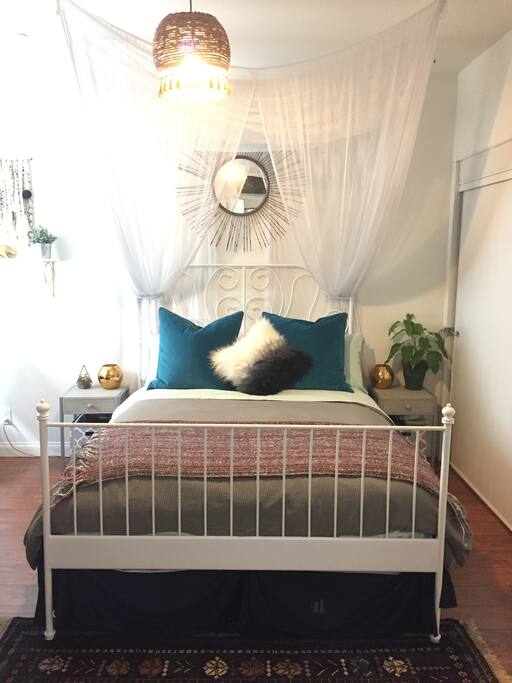 Your bedroom. Queen-size, pillow top bed, dresser, workspace, and Smart TV with Netflix.