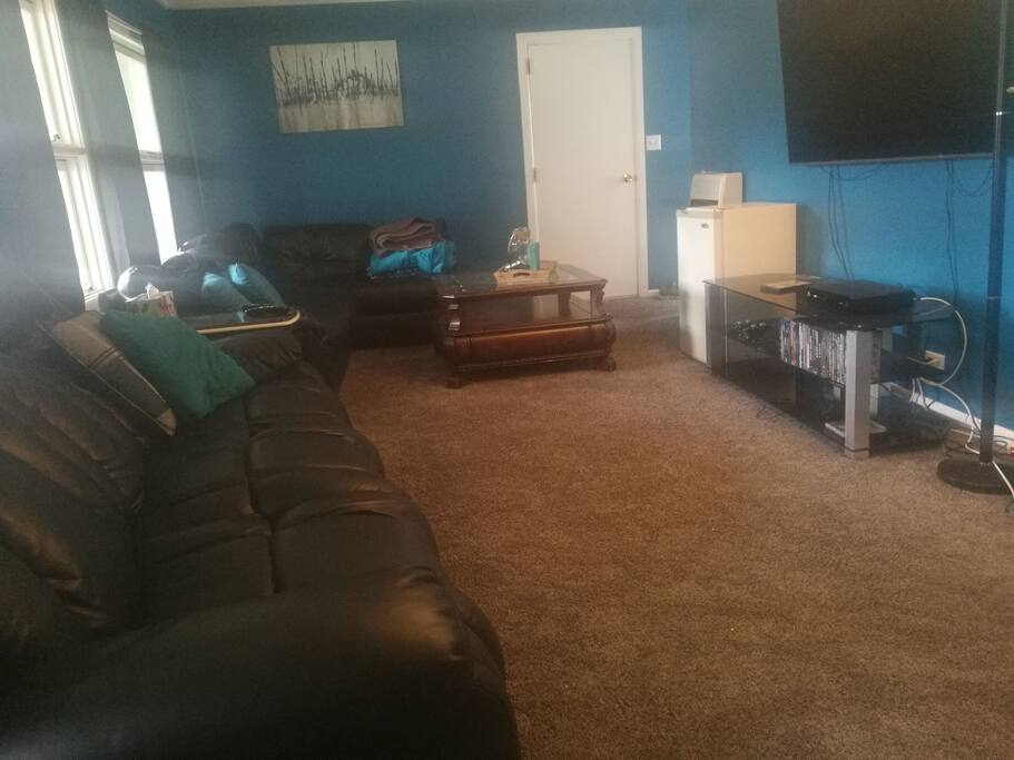 Relax, talk, or watch a movie on these two leather sofas.