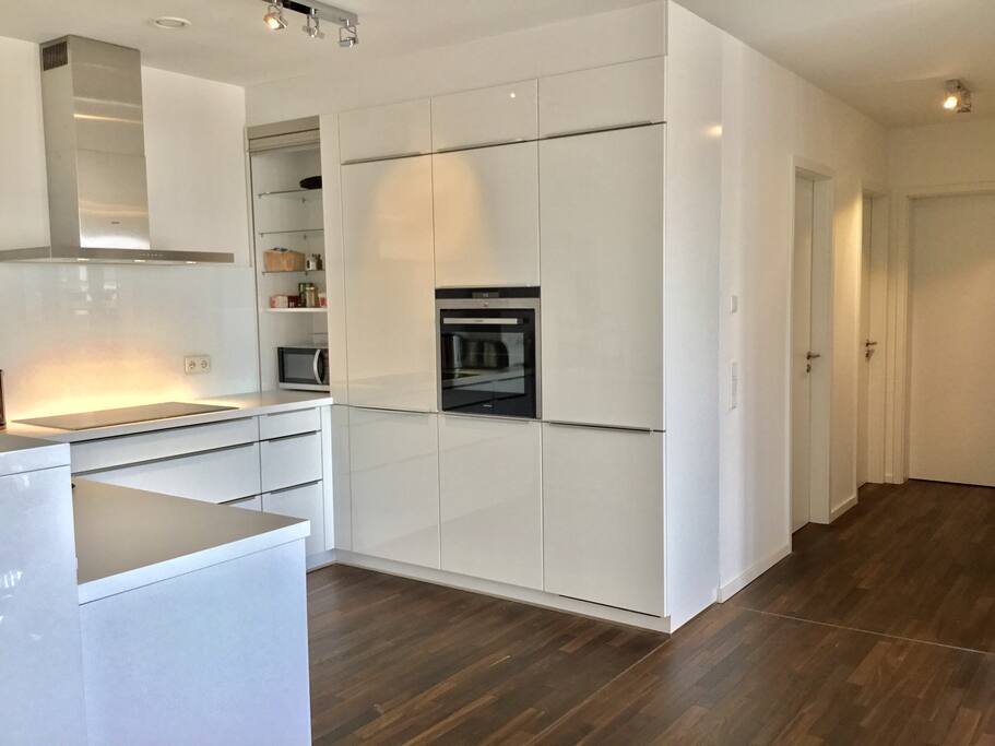 Entrance to apartment opens to the kitchen / hallway.