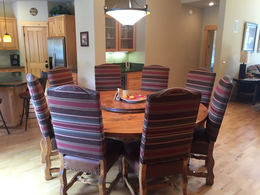 Dining with kitchen to left and family room to right