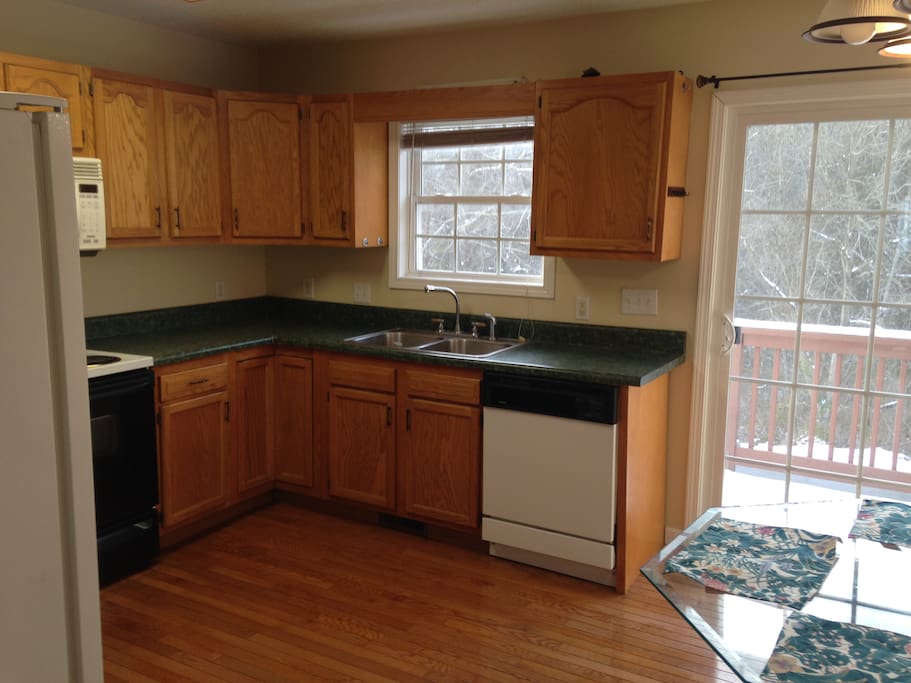 Kitchen with Deck overlooking calming stream