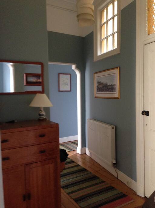 Inside the front door - archway to living room/kitchen