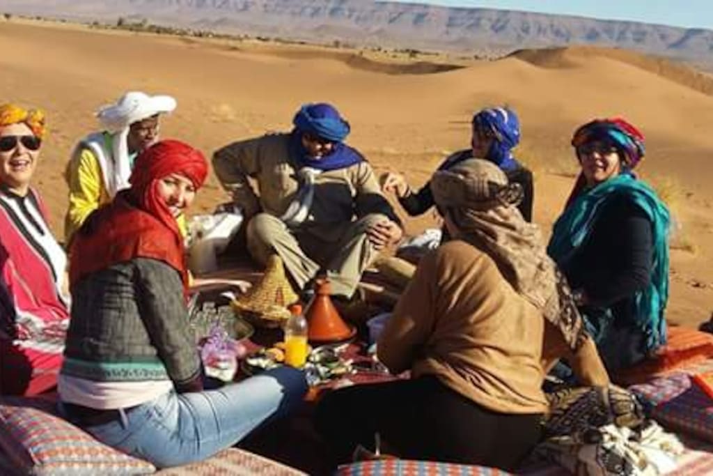 breakfast in big largest dune in north africa border with algeria