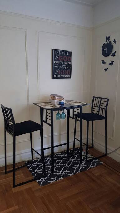Bar style dining area in living room.