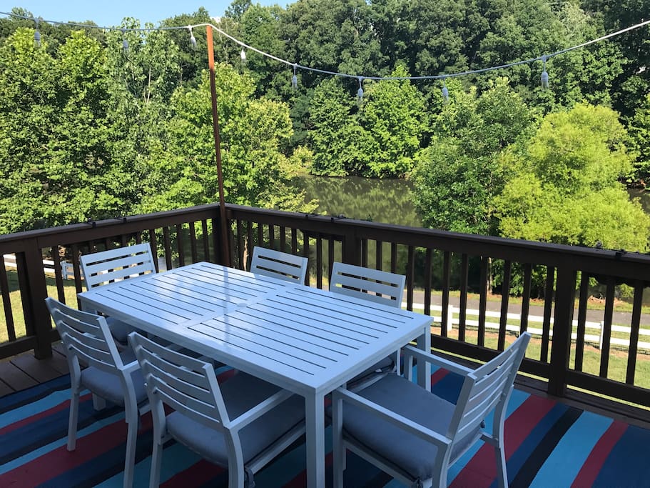 The back deck overlooking the pond is shaded in the afternoon. Great for meal!