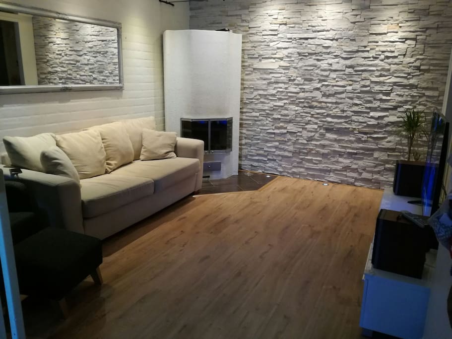 living room with TV on first floor. Sofa bed for 2.
