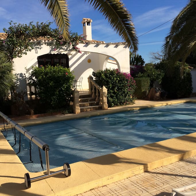 Solar heated pool With cover
