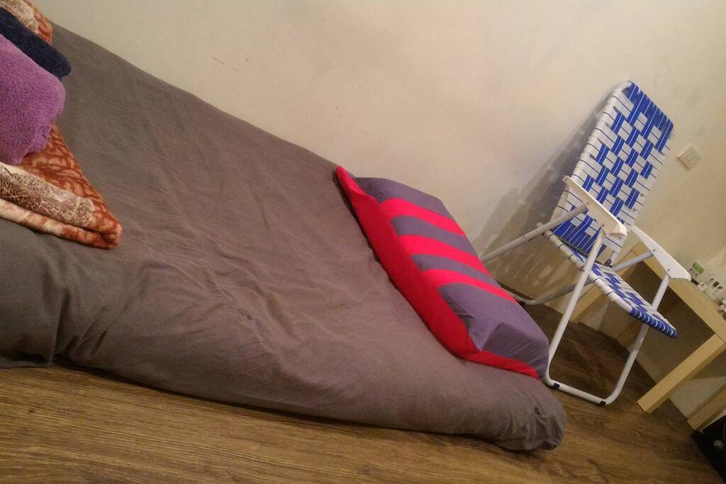 one single bed mattress in the room