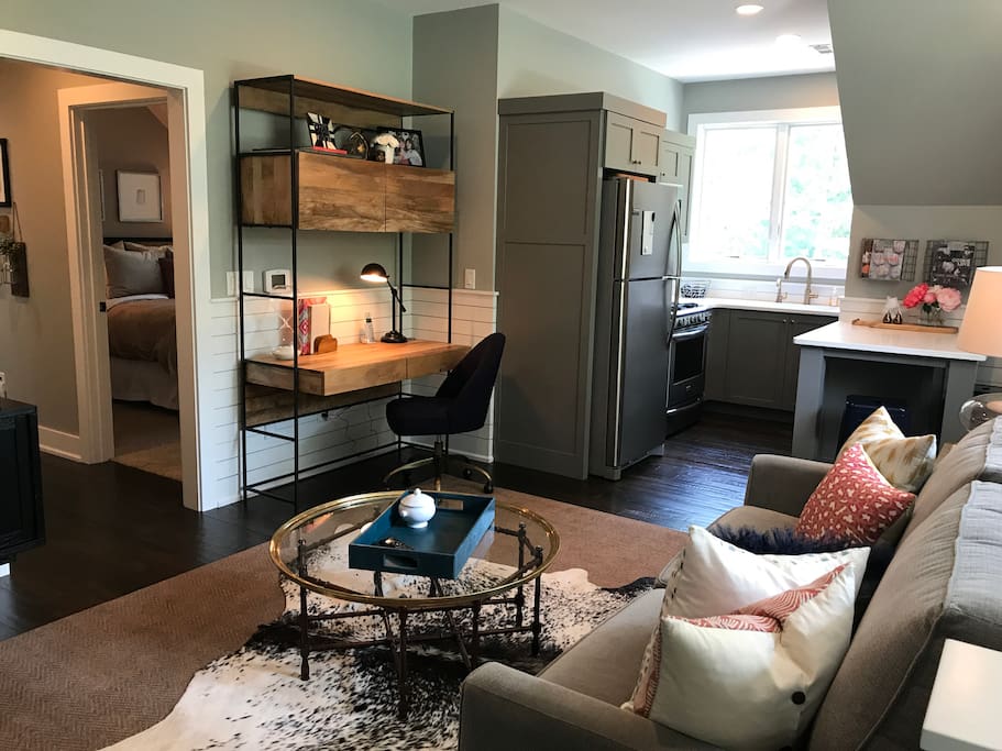 Living room area includes queen temperpedic sleeper sofa.