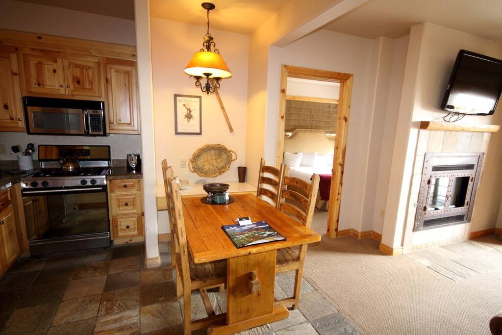 Enjoy a meal at the dining table.