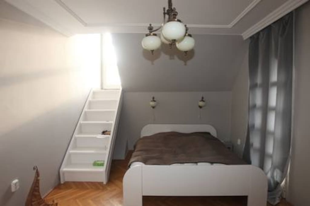 Bedroom one. The stairs lead to another giant terrace.