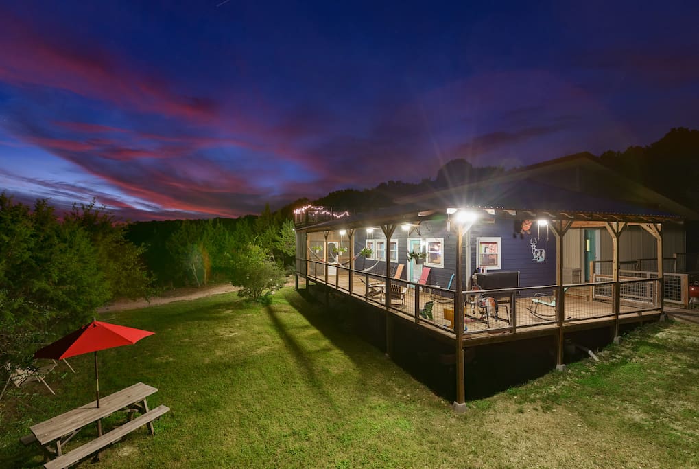 With the wrap around porch, spacious property, bbq, hammocks, rooftop deck and hot tub, this is truly a vacation home!